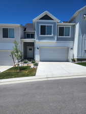 View of front of house with a garage