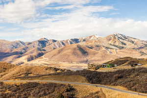 Property view of mountains with a rural view