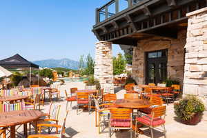 View of patio / terrace featuring a mountain view and a community pool