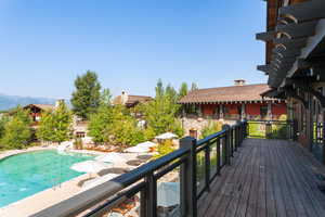 Exterior space featuring a fenced in pool and a mountain view