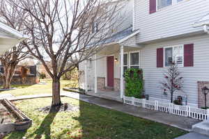 Exterior space featuring a lawn