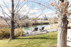 View of yard featuring a water view