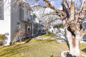 View of yard featuring a porch