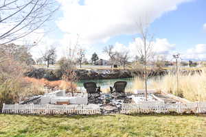 View of yard featuring a water view