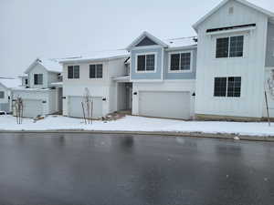 View of front of home featuring a garage