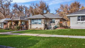 View of front of house with a front yard