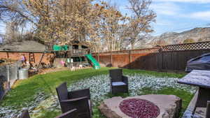 View of yard with a playground