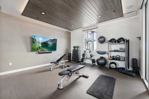 Exercise room featuring wood ceiling