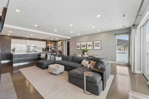 Living room with light hardwood / wood-style flooring