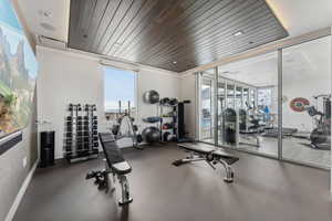 Gym with floor to ceiling windows