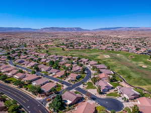 Birds eye view of property featuring a mountain view