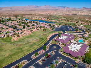 Aerial view featuring a water and mountain view