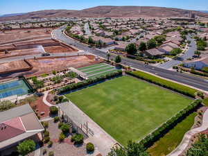 Birds eye view of property with a mountain view