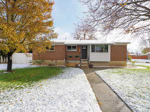 Single story home featuring a front yard