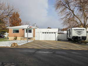 View of front of house with a garage