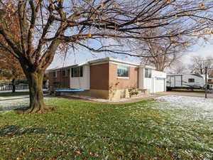 View of home's exterior featuring a yard