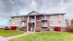 View of property featuring central air condition unit