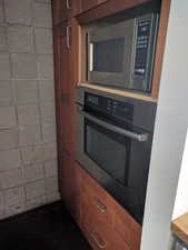 Kitchen with appliances with stainless steel finishes