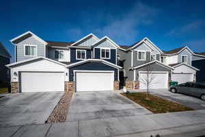 View of front of property with a garage