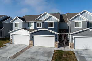 Craftsman house with a garage