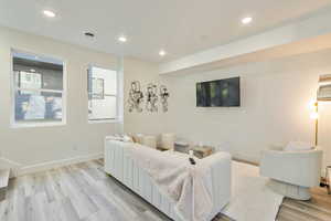 Living room featuring light wood-type flooring