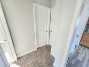 Hallway featuring light hardwood / wood-style floors