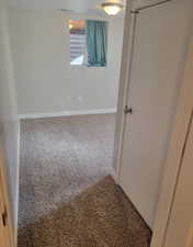 View of carpeted spare room