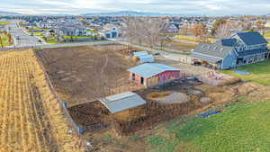 Birds eye view of property featuring a mountain view