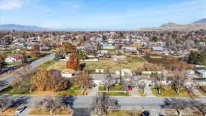 Birds eye view of property with a mountain view