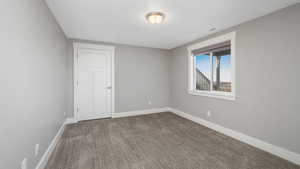 View of carpeted spare room