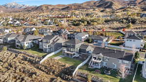 Birds eye view of property featuring a mountain view