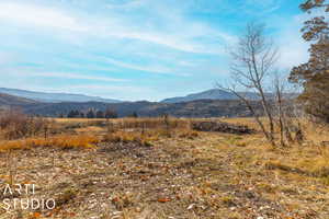 Property view of mountains featuring a rural view