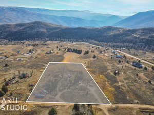 Aerial view featuring a mountain view