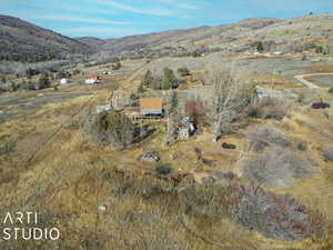 Aerial view with a mountain view and a rural view