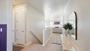 Corridor featuring light hardwood / wood-style floors