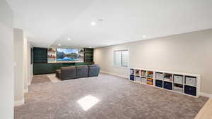 Basement Family Room w/built in custom cabinets