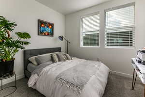 Bedroom featuring carpet flooring