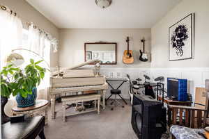 Miscellaneous room featuring carpet