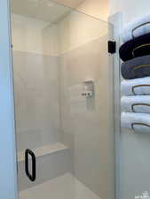 Bathroom featuring a shower with shower door