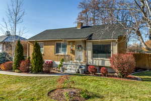 View of front of house featuring a front lawn