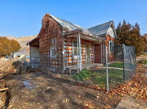 View of front of house featuring a mountain view