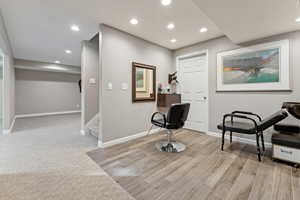 Living area with light wood-type flooring