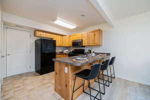 Kitchen with breakfast bar.