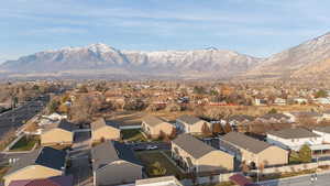 Birds eye view of property featuring a mountain view