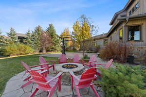 View of patio / terrace featuring an outdoor fire pit