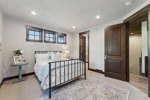 Bedroom with light hardwood / wood-style floors