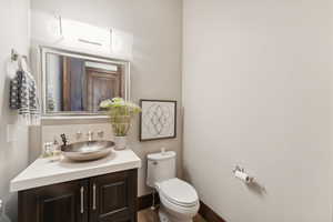 Bathroom with vanity and toilet