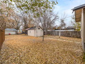 View of yard featuring a storage shed