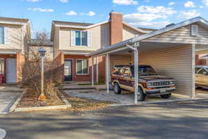 View of front of house featuring a carport