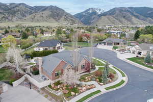 Birds eye view of property featuring a mountain view and a residential view